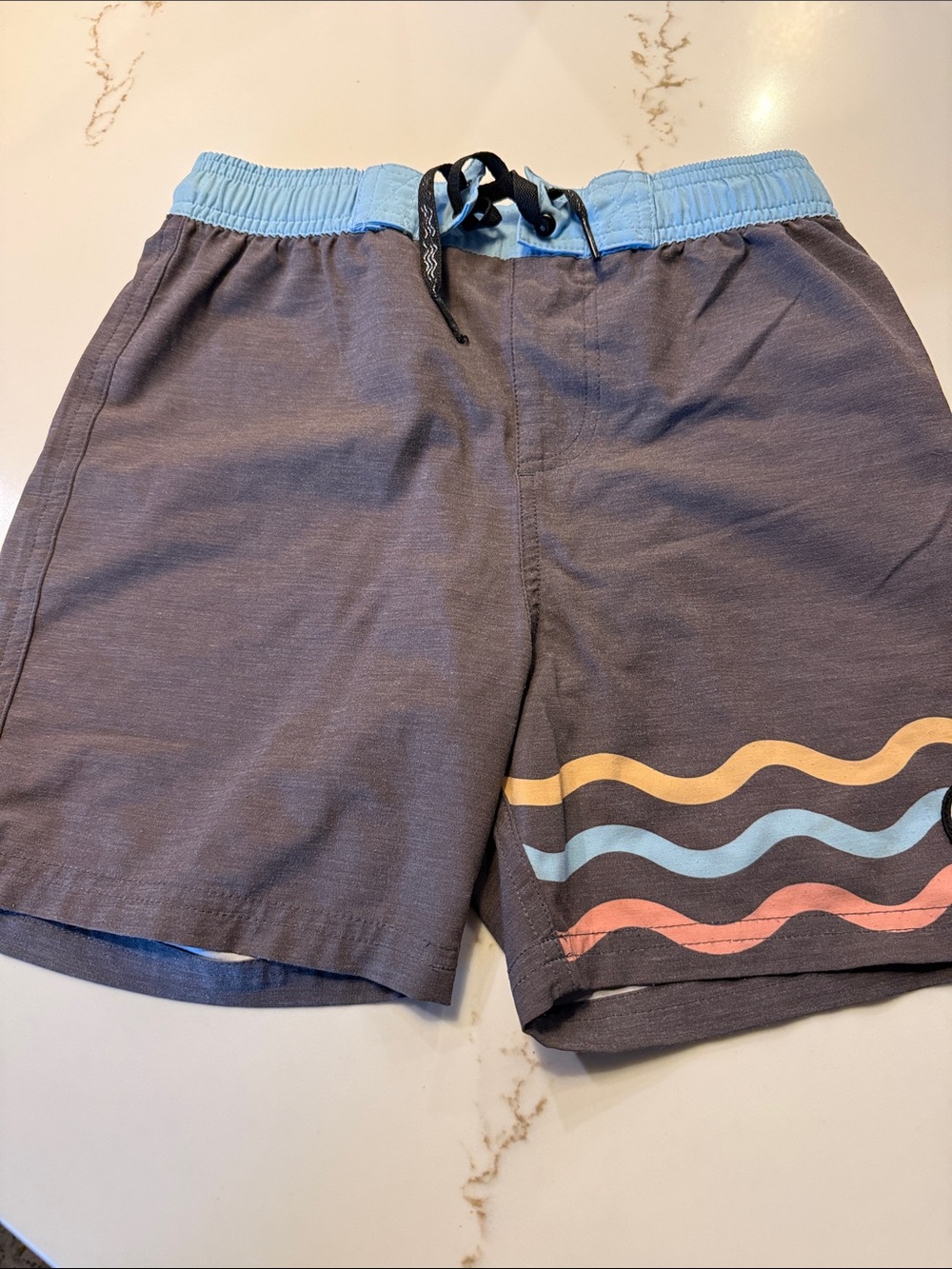 Feather 4 arrow board shorts size 10